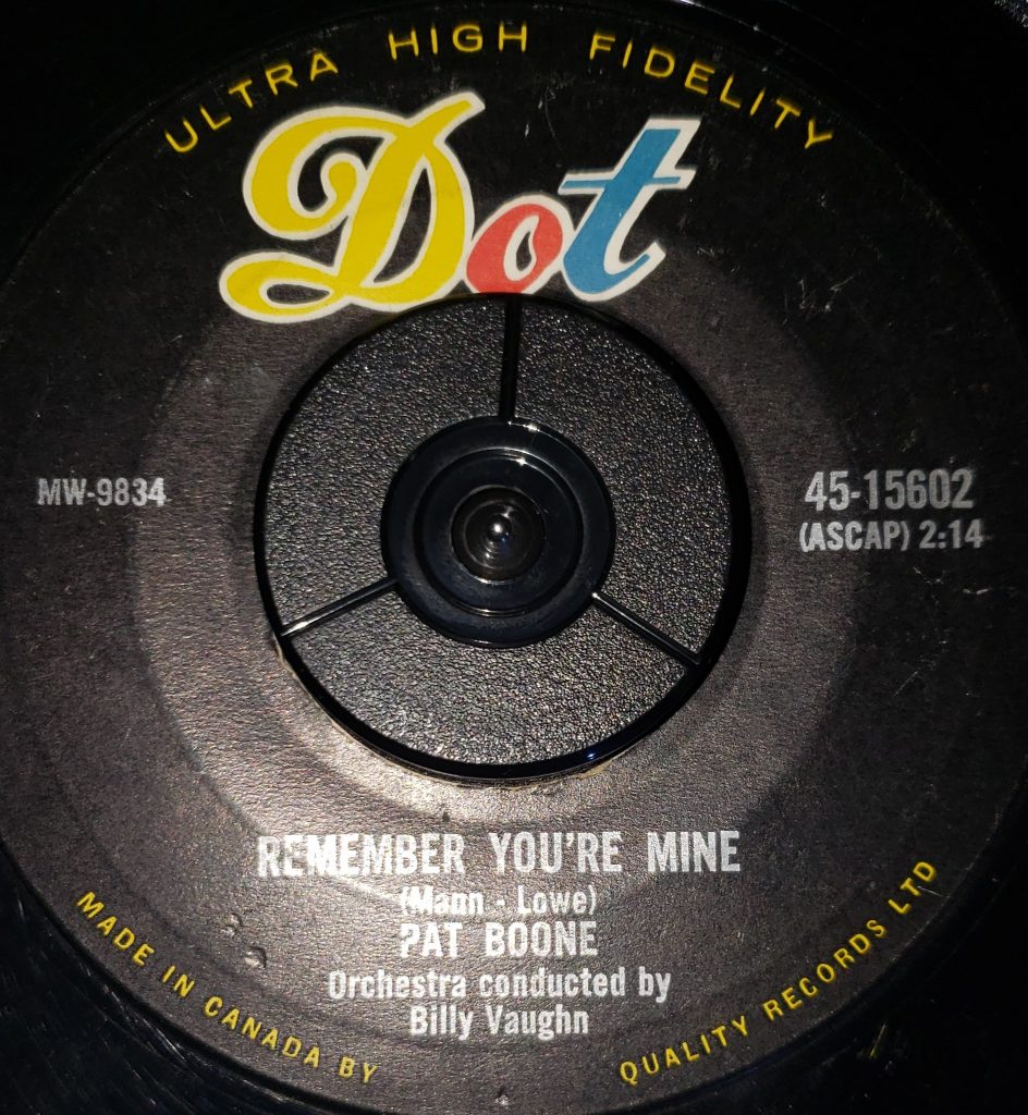 A Side of Pat Boone's single Remember You're Mine / There's a Gold Mine in the Sky